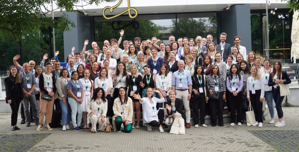 Group photo of EEMGS 2025 conference participants, Dr. Monika Šramková in the front row, first from the right.